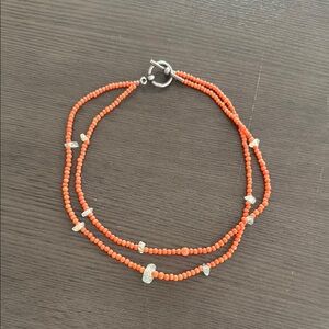 Elegant Orange Bead and blue glass Necklace